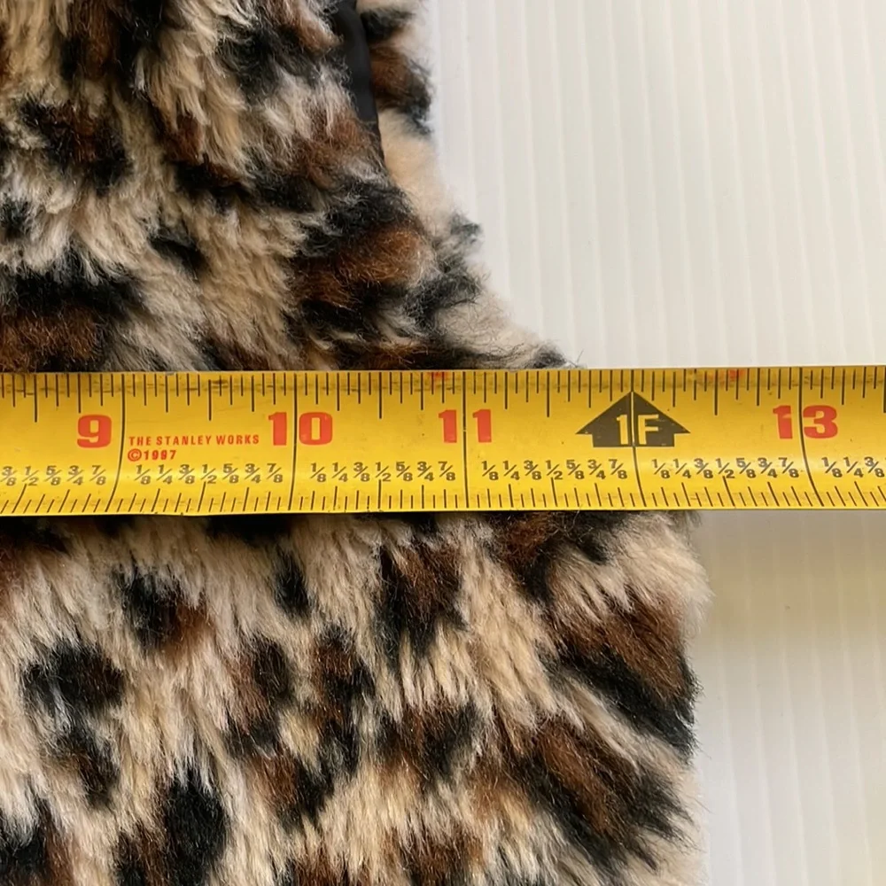 Me Jane black, brown & tan faux fur vest.  Girl’s size 7